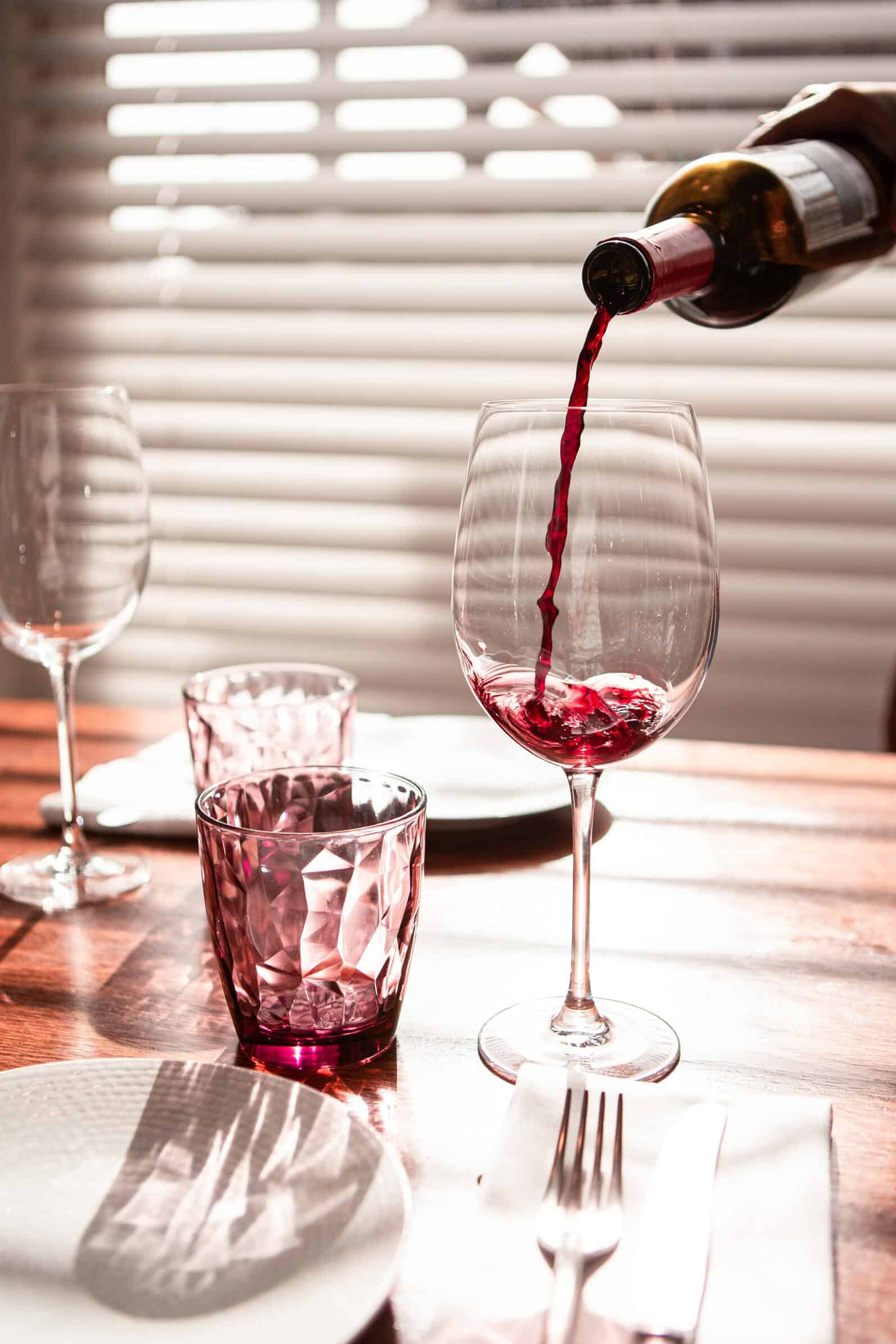 red wine poured into glass